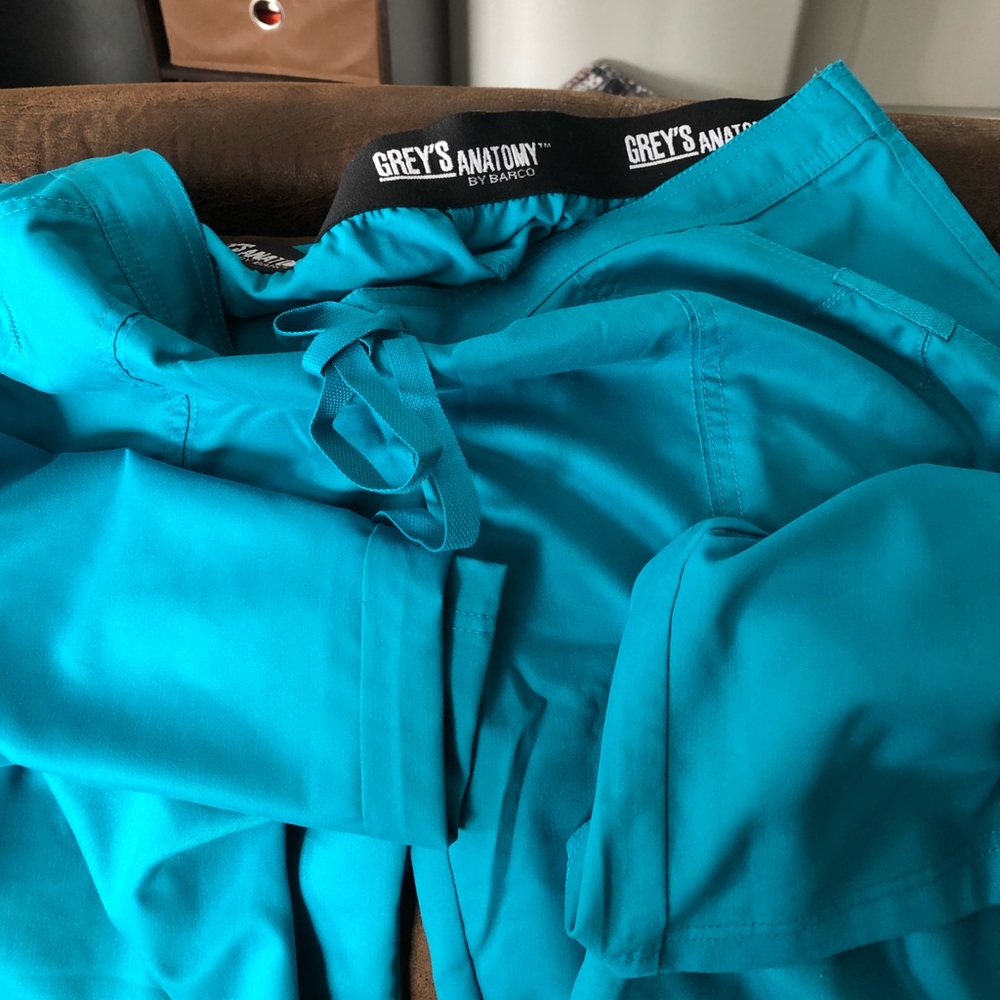 Scrub bottoms and Scrub tops.